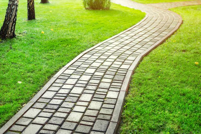 Stone Mason Contract Pathway in Grass